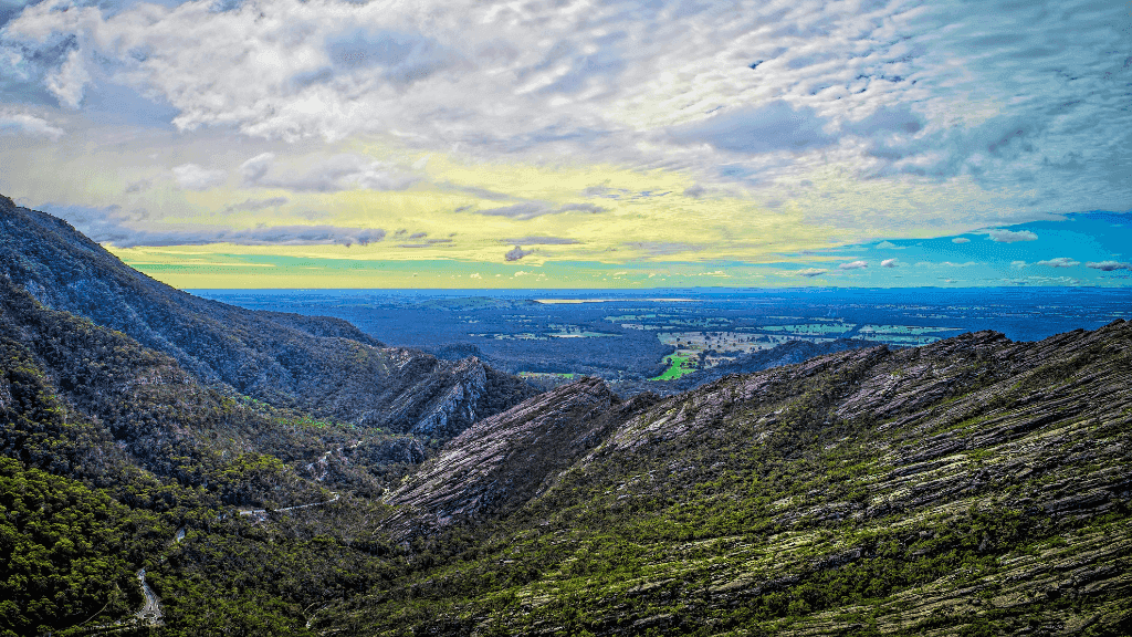 Breathtaking view of the Northern Grampians with rugged mountains and green valleys, perfect for outdoor adventure tours.