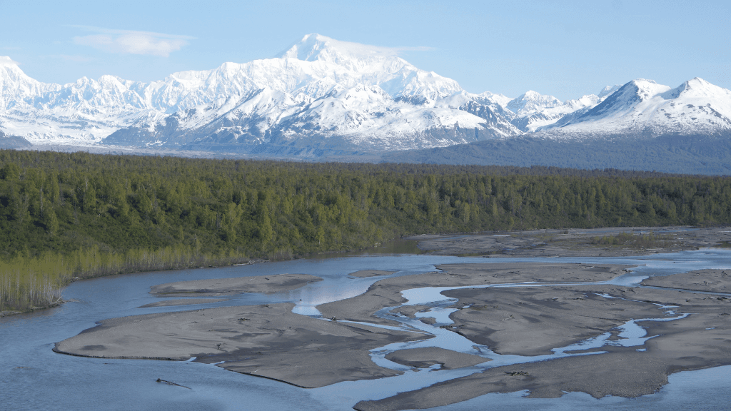 Snowy Denali mountain range with braided rivers seen on the 8-Day Alaskan Adventure: Glaciers & Grizzlies tour.