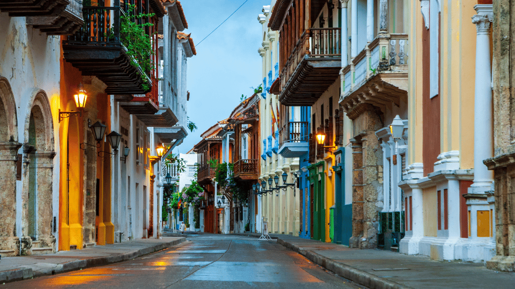 Colorful colonial buildings line a quiet street in Cartagena, Colombia, showcasing cultural charm on the Costa Rica to Colombia Tour.