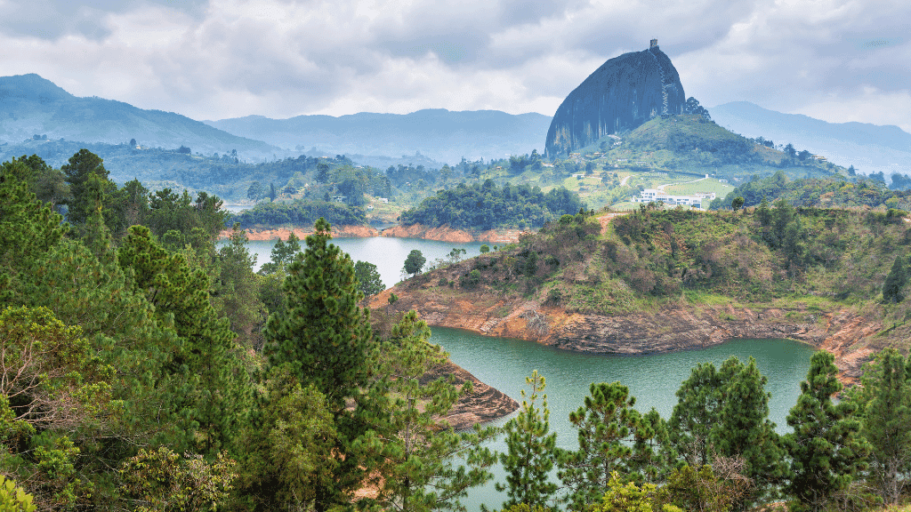 Scenic view of El Peñol rock and lakes in Guatapé, a must-see stop on the Colombia 17-Day Adventure - Travel Guide | Highlights Tour.