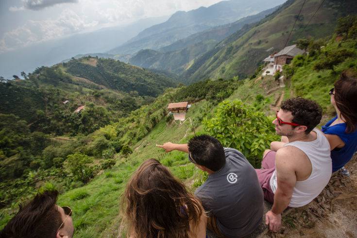 Group of young travelers enjoying a mountain view in Colombia’s coffee region on the Colombia 17-Day Adventure - Travel Guide | Highlights Tour.
