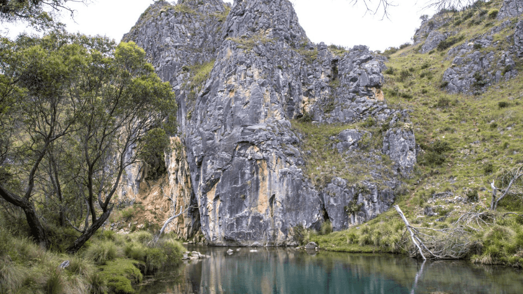 Blue Waterholes gorge with turquoise water and limestone cliffs on Mt Bimberi & Blue Waterholes - Tour Adventure. Great for hiking and photography.