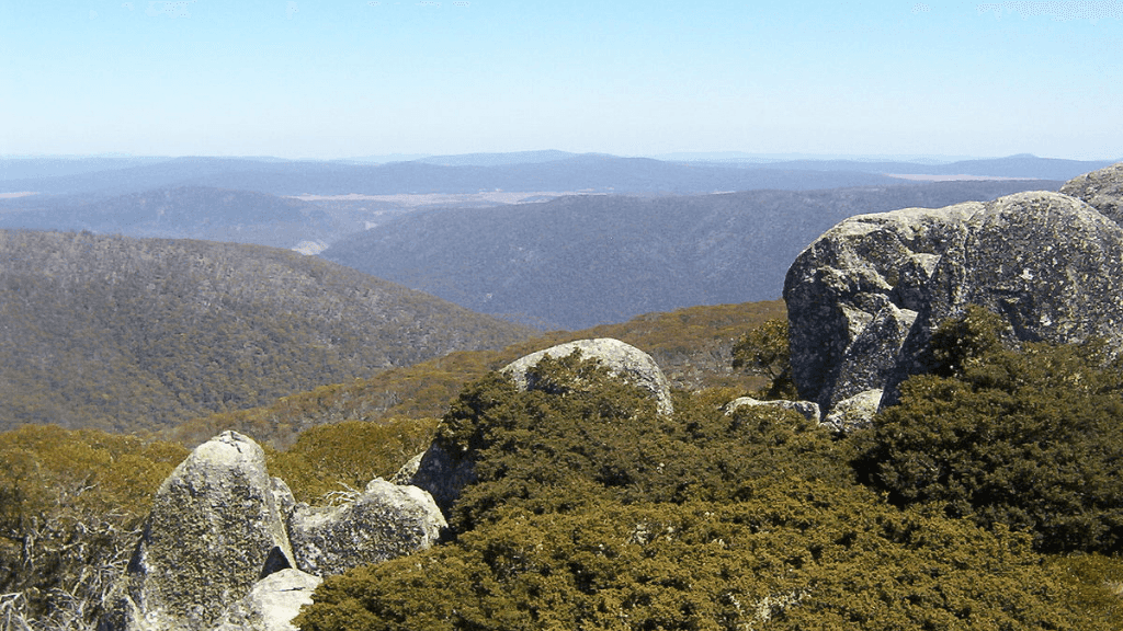 Rocky summit views from Mt Bimberi on the Mt Bimberi & Blue Waterholes - Tour Adventure. A top destination for wilderness trekking in Australia.