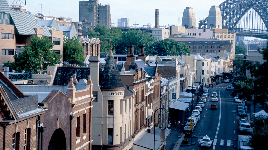 Historic buildings in The Rocks, Sydney, featured on East Coast Australia tour. Cultural start to 8-day journey from Sydney to Brisbane.
