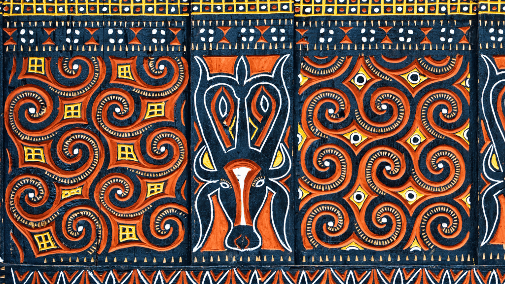 Colorful Torajan textile patterns with intricate motifs, showcasing local craftsmanship on the Soul of Sulawesi - Tana Toraja Culture Tour.