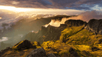 Golden sunset over Madeira’s volcanic mountain range, part of the scenic 6-days hiking Madeira’s trails tour.