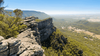 Stunning view from the ridge in the Northern Grampians, showcasing rugged cliffs and lush valleys.