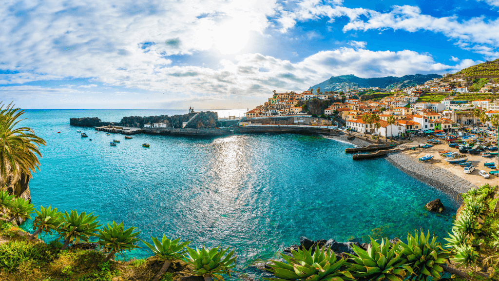 Colorful coastal village and harbor in Madeira, a picturesque stop during the 6-days hiking Madeira’s trails journey.