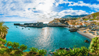 Colorful coastal village and harbor in Madeira, a picturesque stop during the 6-days hiking Madeira’s trails journey.