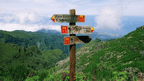 Trail signpost pointing to Pico Ruivo and other peaks, guiding trekkers on the 6-days hiking Madeira’s trails adventure.