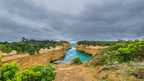 Majestic coastal view of cliffs and turquoise waters near the Twelve Apostles on the Great Ocean Walk.