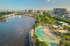 Aerial view of Brisbane River and South Bank, the starting point of the Whitsundays Reef Tour to Cairns.
