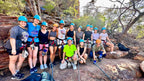 Group of travelers geared up for rock climbing in Kalbarri National Park on West Coast Road Trip. Outdoor recreation in Western Australia.