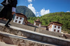 View of a dzong from stone steps, part of the cultural exploration on the Trans Bhutan Trail tour.