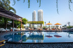 Luxury hotel pool with city view in Thailand, offering relaxation on the Angkor to Islands 16-Day Tour - Khmer Culture to Thai Coasts.
