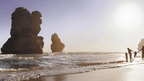 Group enjoying the Twelve Apostles at sunset during an outdoor adventure on the Great Ocean Walk.