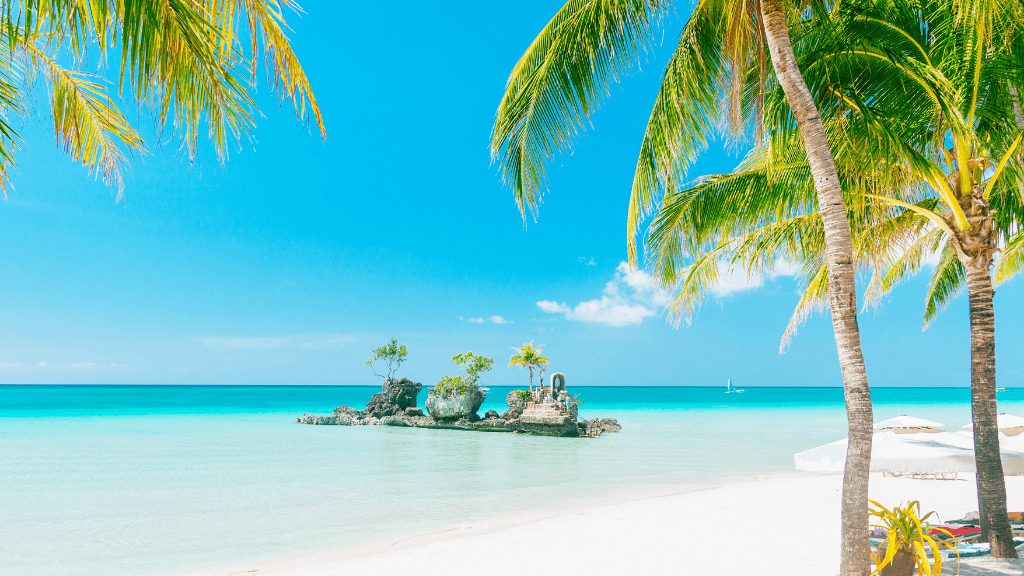 White sand beach and turquoise waters in Boracay, tropical escape in Philippines Travel Tours - Icons of the Philippines | 10/14/23 Days.