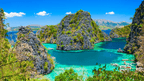 Turquoise waters and limestone cliffs in Coron, Palawan, featured in Philippines Travel Tours - Icons of the Philippines.