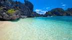 Crystal-clear beach and limestone cliffs in Palawan, tropical paradise in Philippines Travel Tours - Icons of the Philippines.