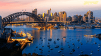 Sydney Harbour Bridge and skyline at dusk, iconic view on East Coast Australia tour. Starting point of 8-day Byron to Brisbane journey.