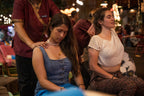 Tourists enjoy traditional Thai massage at night market, a relaxing treat on the Angkor to Islands 16-Day Tour - Khmer Culture to Thai Coasts.