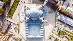 Aerial view of a grand mosque in Central Asia, showcasing Islamic architecture on the Silk Road Cities Tour - Central Asia Adventure.