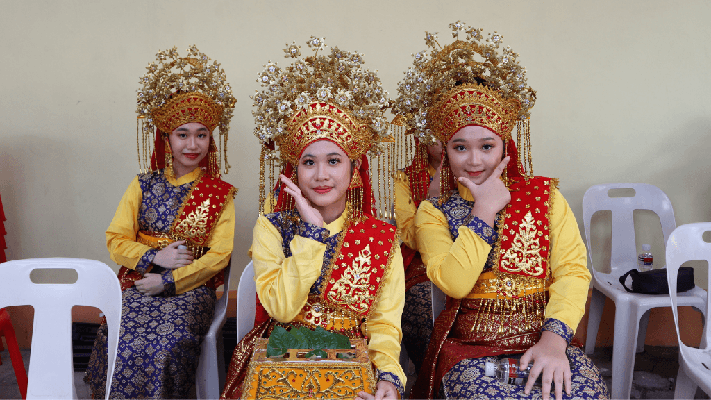 Women in traditional Central Asian attire during a cultural event, part of the Silk Road Cities Tour - Central Asia Adventure.