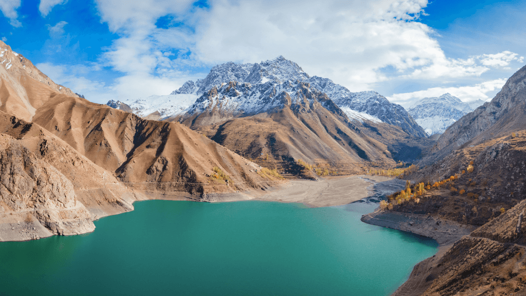 Stunning alpine lake in the Fann Mountains, Tajikistan, a trekking highlight of the Silk Road Cities Tour - Central Asia Adventure.