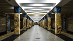 Elegant interior of Tashkent Metro with marble columns, a unique stop on the Silk Road Cities Tour - Central Asia Adventure.