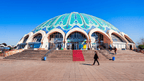 Colorful domed Chorsu Bazaar in Tashkent, Uzbekistan, a cultural shopping experience on the Silk Road Cities Tour - Central Asia Adventure.
