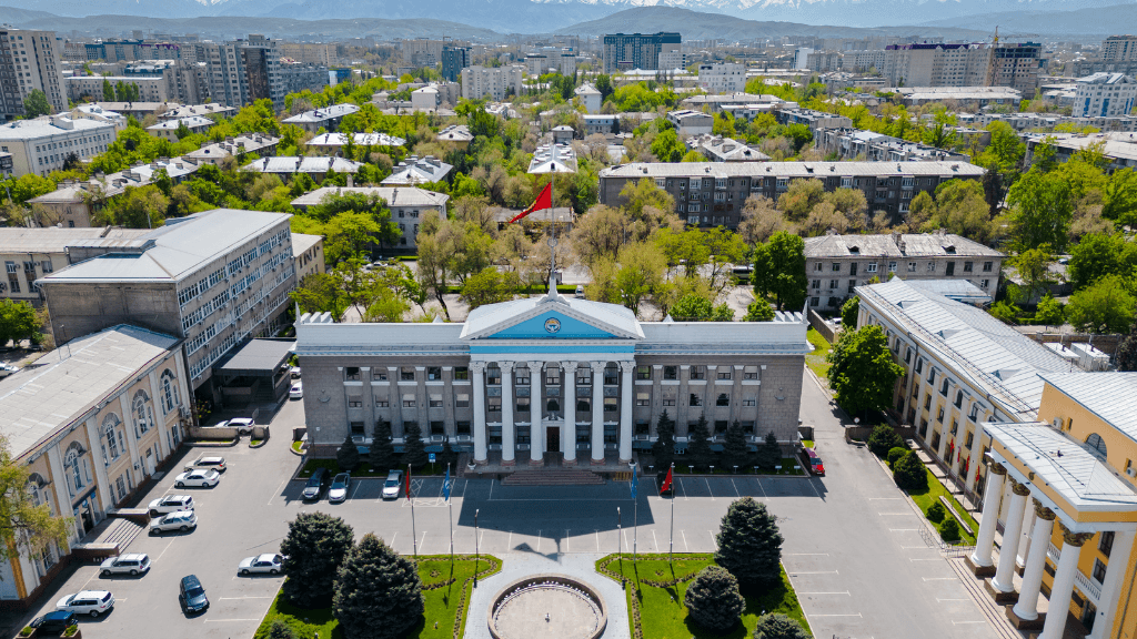 Government building in Bishkek, Kyrgyzstan, a modern city highlight on the Silk Road Cities Tour - Central Asia Adventure.