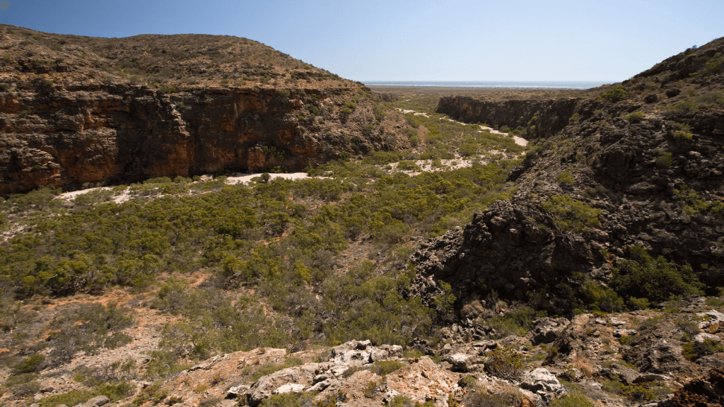 Breathtaking view of Cape Range's rugged landscapes, perfect for adventure seekers on a 3-day trek.