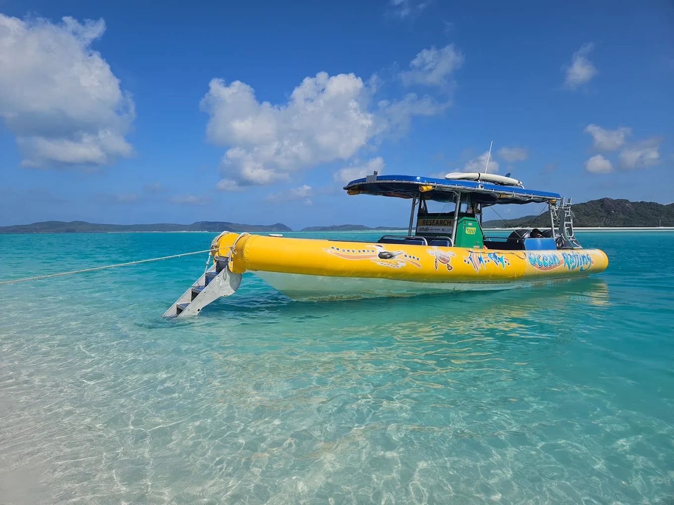 Fly & Raft Southern Whitehaven Beach Day Tour from Airlie Beach
