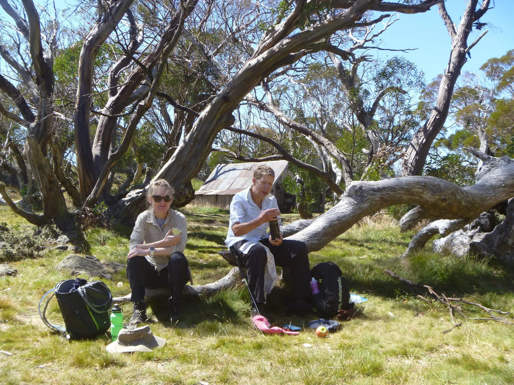Group enjoying a break during the High Country Horizons hiking tour in the Victorian Alps.